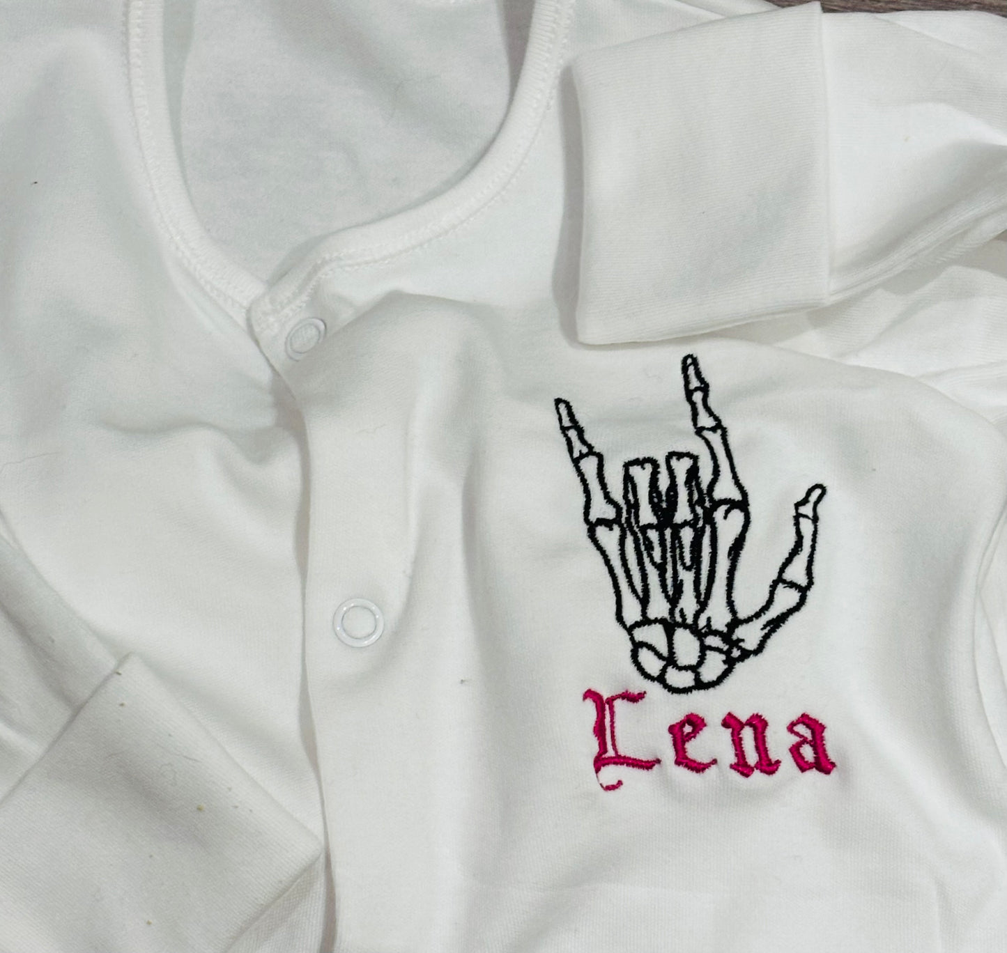 Skeleton Rock Hands Personalised Embroidered Baby Grow & Sleepsuit