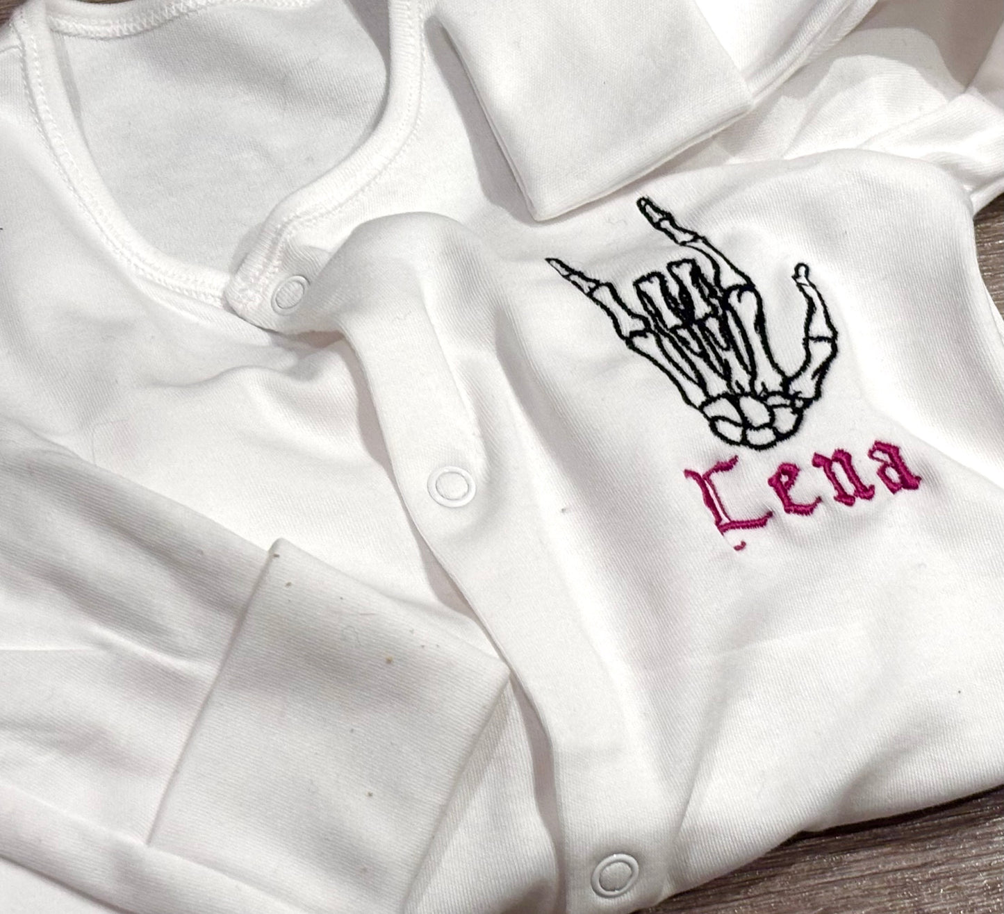 Skeleton Rock Hands Personalised Embroidered Baby Grow & Sleepsuit